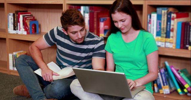 Students Collaborating on Laptop in Library Setting - Download Free Stock Images Pikwizard.com