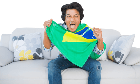 Enthusiastic football fan with brazilian flag on transparent background