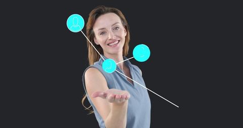 Smiling woman presenting digital connectivity icons graduate