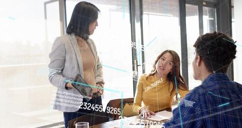 Discussing data strategy in glass office with digital analytics and teamwork