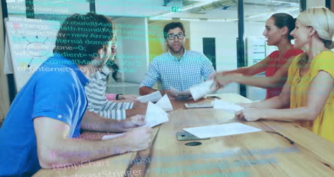 Diverse Team Celebrating Success Amidst Programming Code Overlay