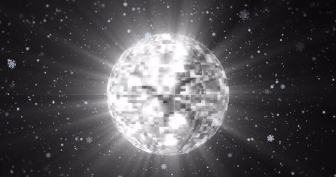 Glittering Disco Ball with Falling Snowflakes on Black Background - Download Free Stock Images Pikwizard.com