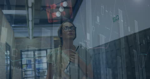Businesswoman Analyzing Market Data with Digital Overlay
