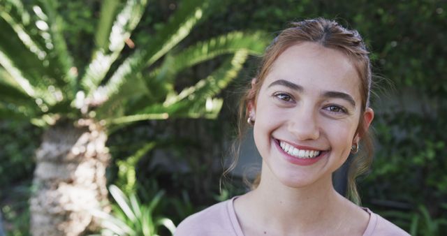 Smiling Young Woman Enjoying Outdoor Greenery - Download Free Stock Images Pikwizard.com