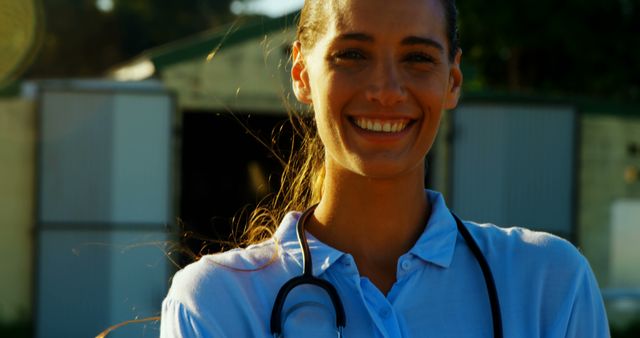 Smiling Female Veterinarian in Outdoor Setting - Download Free Stock Images Pikwizard.com