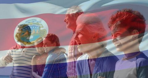 Multigenerational family celebrating costa rica pride on sunlit pacific coastline