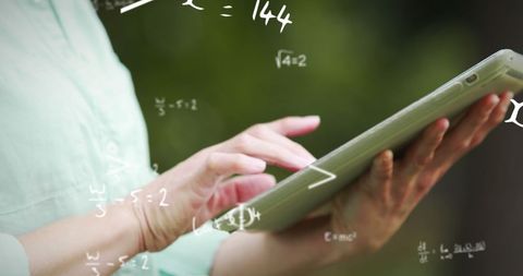 Woman using tablet with math equations overlay
