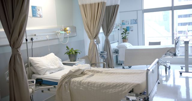 Empty Hospital Room with Beds and Medical Equipment in Daylight - Download Free Stock Images Pikwizard.com