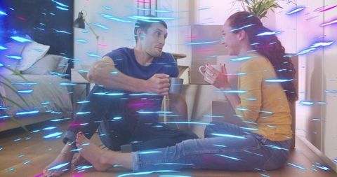 Young Couple Enjoying Cozy Moment with Coffee at Home