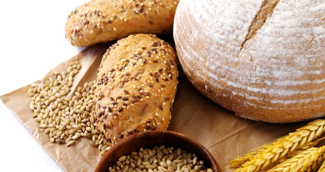 Freshly Baked Bread with Wheat Grains - Download Free Stock Images Pikwizard.com