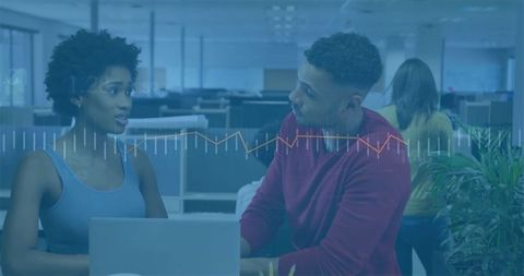 Business Team Discussing Work in Open-Plan Office