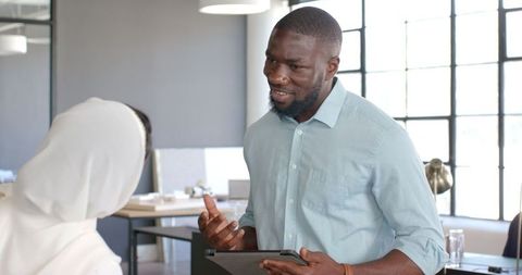 Diverse Colleagues Engaging in Business Strategy Meeting