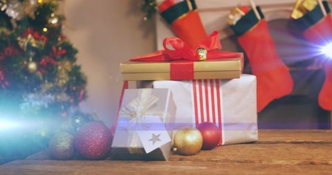Festive Christmas Presents and Decorations by Fireplace - Download Free Stock Images Pikwizard.com