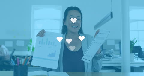 Businesswoman Analyzing Graphs with Interactive Social Media Icons