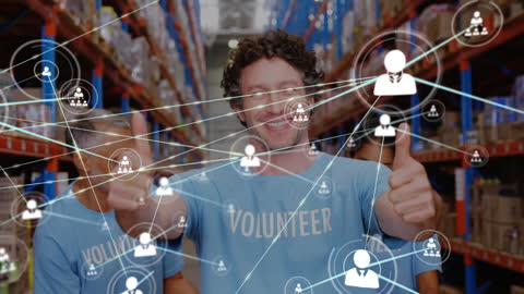 Volunteer in Warehouse Showing Thumbs Up with Network Graphics