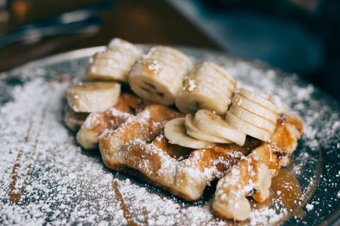 Belgian Waffles with Sliced Bananas and Powdered Sugar