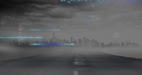 Foggy coastal highway leading toward futuristic city skyline with blue HUD and stormy sky