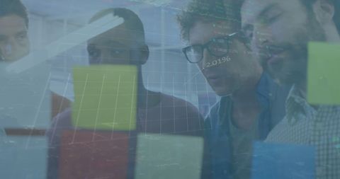 Diverse Business Team Analyzing Data with Digital Interface Collaboration