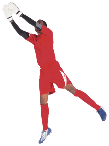 Professional goalkeeper in action blocking ball transparent