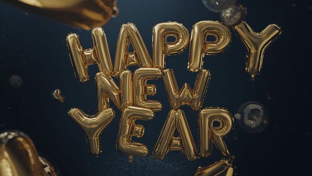 Floating Gold Foil Letter Balloons Spelling HAPPY NEW YEAR Dark Blue Festive Background