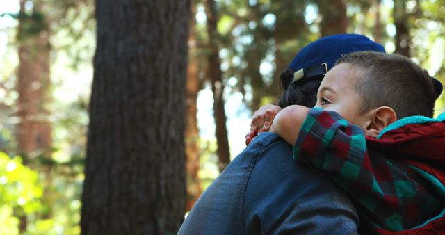 Father Carrying Son on Shoulder in Forest - Download Free Stock Images Pikwizard.com