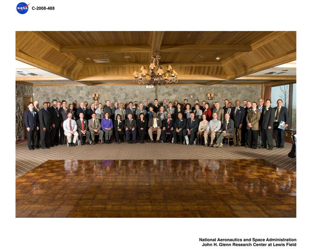 Group of Professionals in Formal Attire at Corporate Event in Elegant Hall - Download Free Stock Images Pikwizard.com