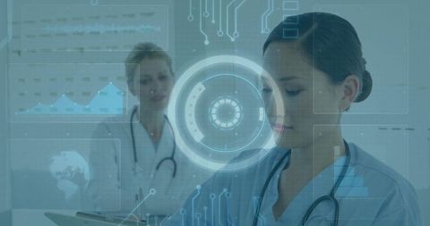 Female clinicians using augmented reality interface for digital diagnostics and teamwork