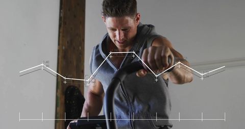 Digital fitness technology with an active man at the gym