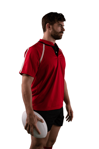 Caucasian male rugby player standing with ball on transparent background