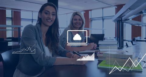 Two Happy Businesswomen in Office with Digital Data Interface - Download Free Stock Images Pikwizard.com