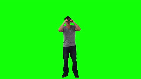 Man Looking Through Binoculars On Green Screen Background