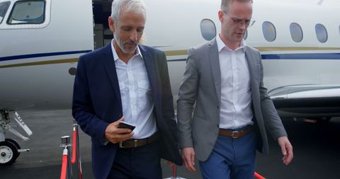 Business Professionals Exiting Luxury Private Jet - Download Free Stock Images Pikwizard.com