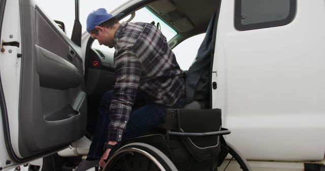 Man in wheelchair entering vehicle independently - Download Free Stock Images Pikwizard.com