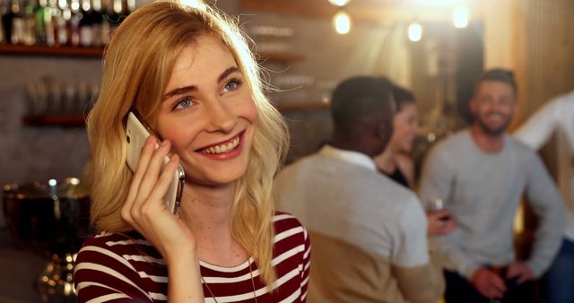 Woman Talking on Phone in Busy Cafe - Download Free Stock Images Pikwizard.com