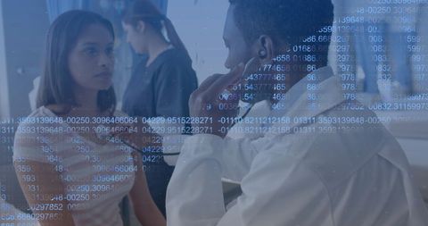 Medical Consultation with Data Overlay Highlighting Modern Healthcare