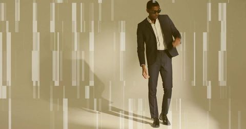 Businessman in dark suit with futuristic glitch effect