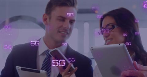 Business Professionals Discussing 5G Technology with Mobile Devices
