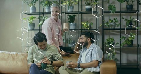 Modern office break area with diverse team collaboration