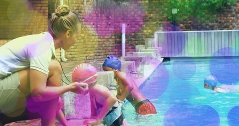 Instructor guiding children in backyard pool activities with swimming caps