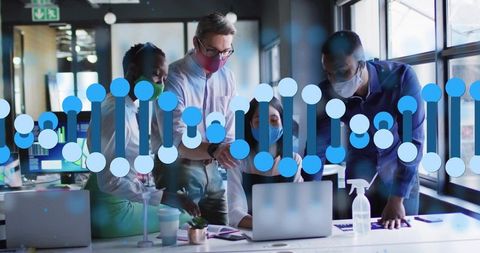 Multiracial team collaborating on laptop with abstract data nodes overlay, wearing masks