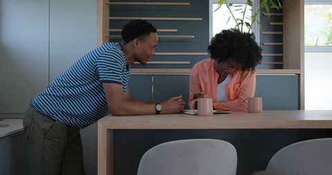 Modern Couple Enjoying Casual Coffee and Conversation