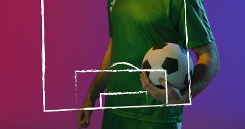 Confident Soccer Player Holding Ball with Futuristic Design