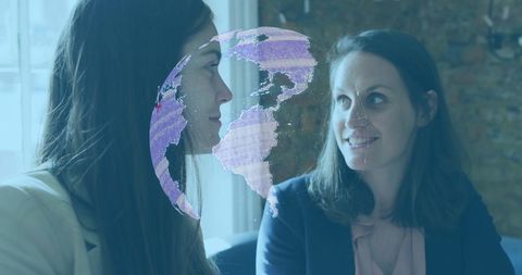 Businesswomen Collaborating with Digital Globe Integration