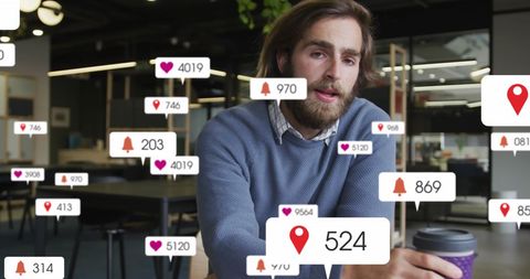 Businessman Analyzing Social Media Insights in Modern Office