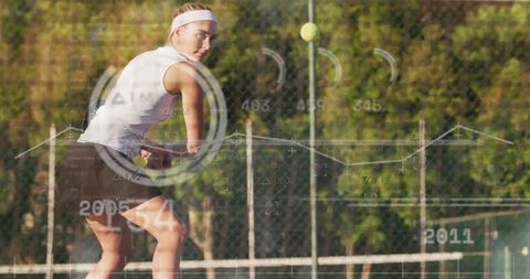 Focused Tennis Player Ready to Hit Ball During Outdoor Match