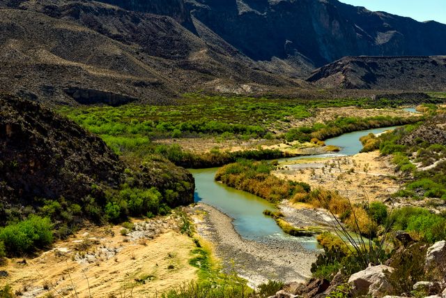 Serene River Valley in Arid Mountain Landscape - Download Free Stock Photos Pikwizard.com