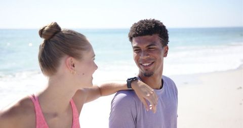 Joyful Moment Between Friends on Sunny Beach