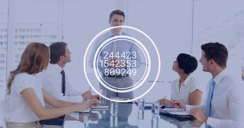 Business Meeting with Data Overlay and Diverse Professionals