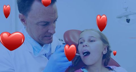 Caring Dentist Helping Young Girl with Dental Treatment