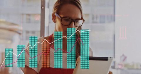 Barista Analyzing Data on Tablet with Digital Graphs Overlay